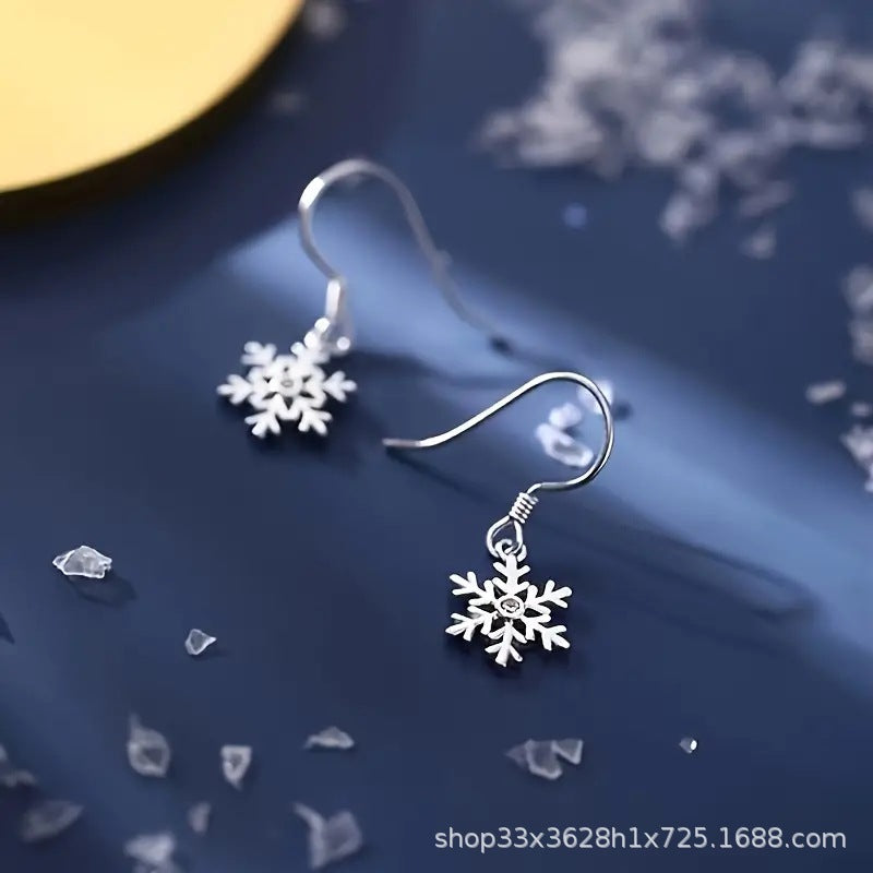 Wholesale Hollow Snowflake Alloy Drop Earrings Simple Flower Earrings